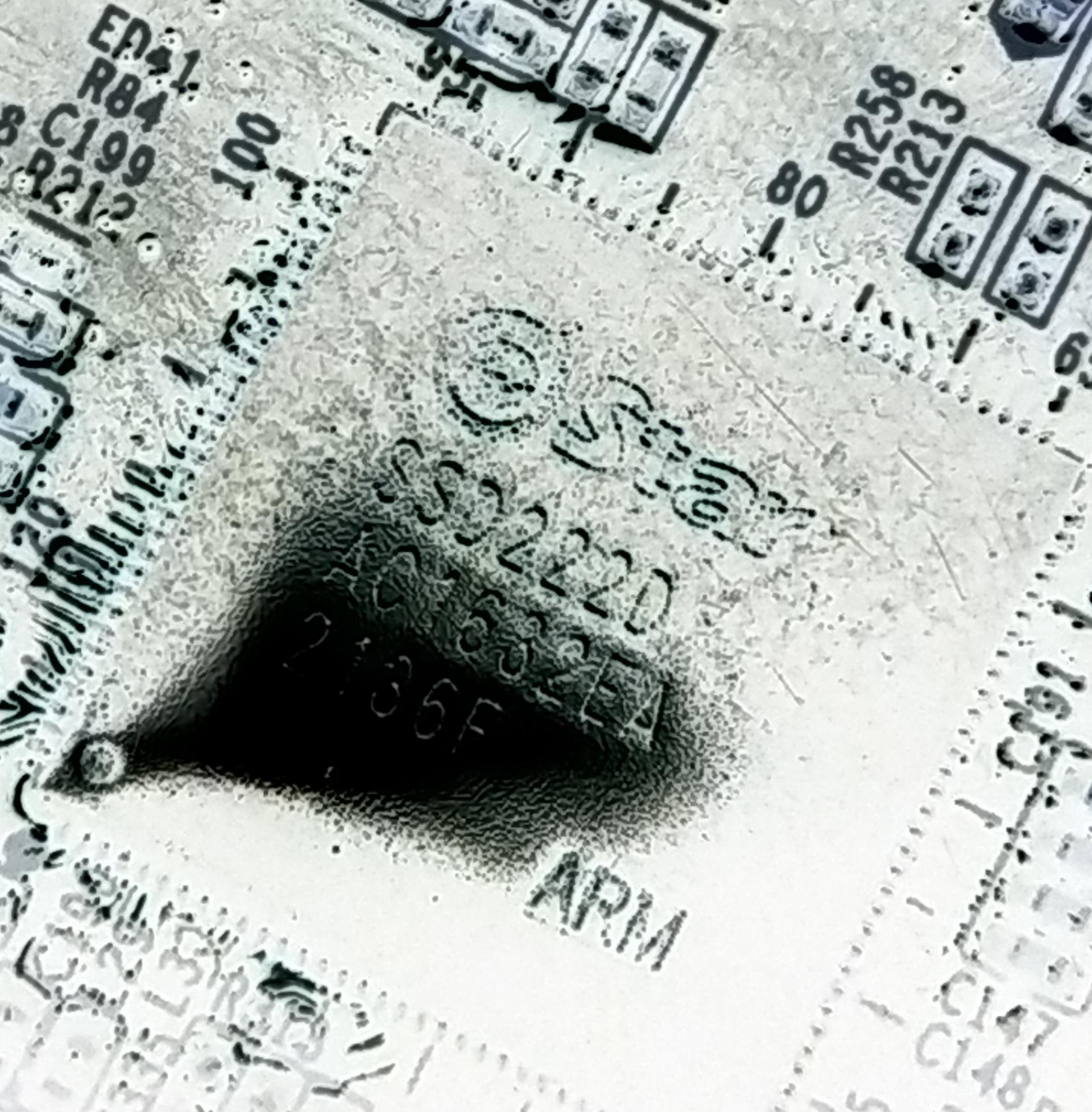 Picture with inverted color to show the model number of the CPU